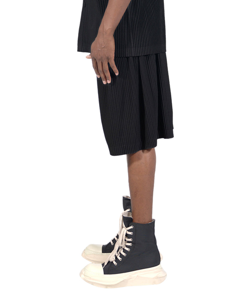 CRTA© "Sombre" Pleated Shorts